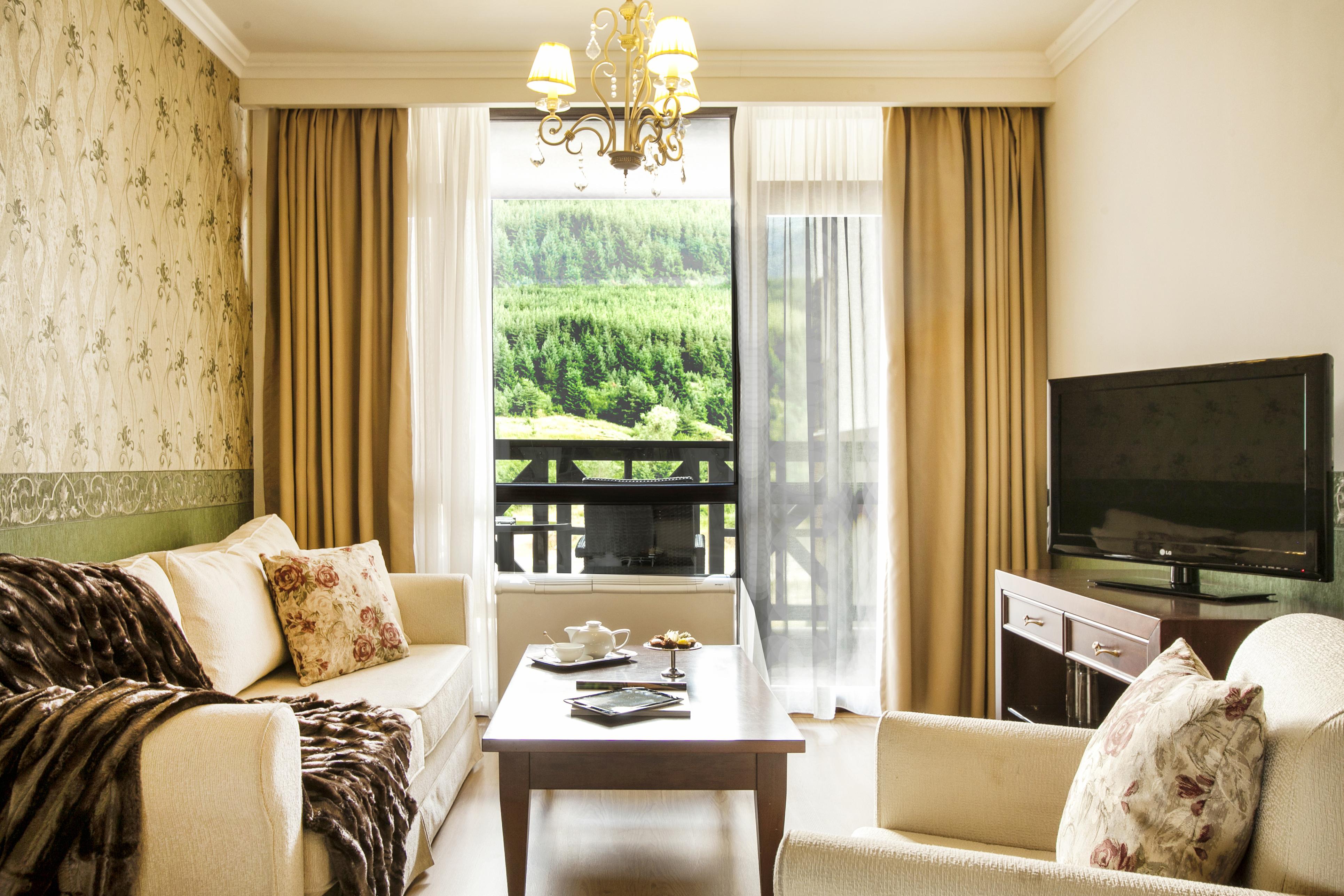 Premier Luxury Mountain Resort Bansko Exterior foto A living room in a hotel